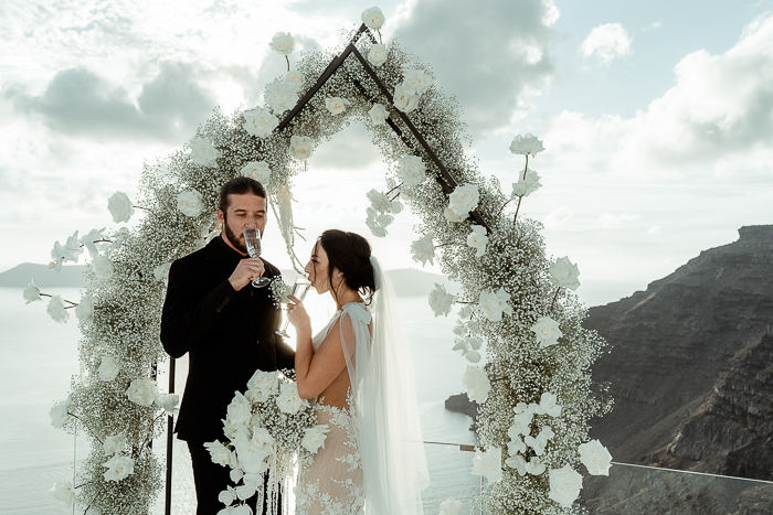 This Romantic Santorini Elopement Was Overflowing With Florals