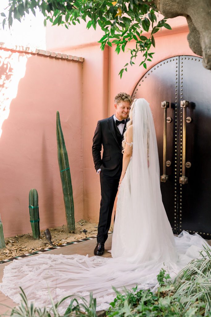 Glam black and pink Sands Hotel Palm Springs wedding with the cutest flower girls